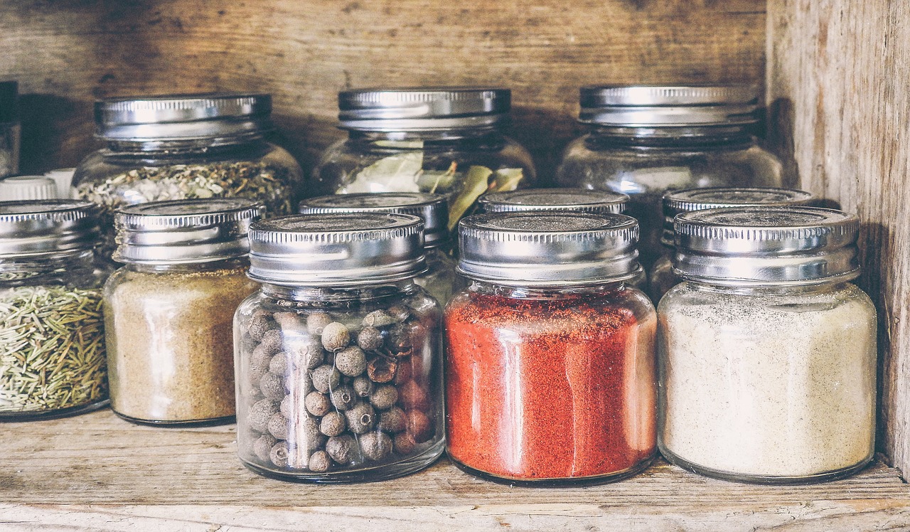 image: jars of spices in pantry